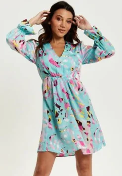 Women Liquorish Abstract Print Mini Dress With Open Back And Long Sleeves