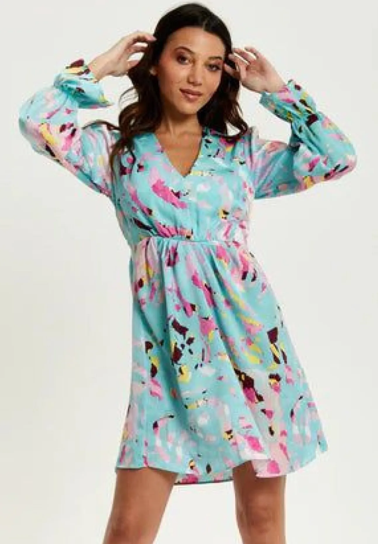 Women Liquorish Abstract Print Mini Dress With Open Back And Long Sleeves