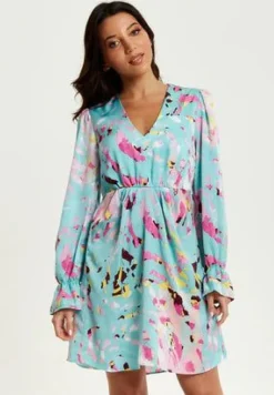 Women Liquorish Abstract Print Mini Dress With Open Back And Long Sleeves