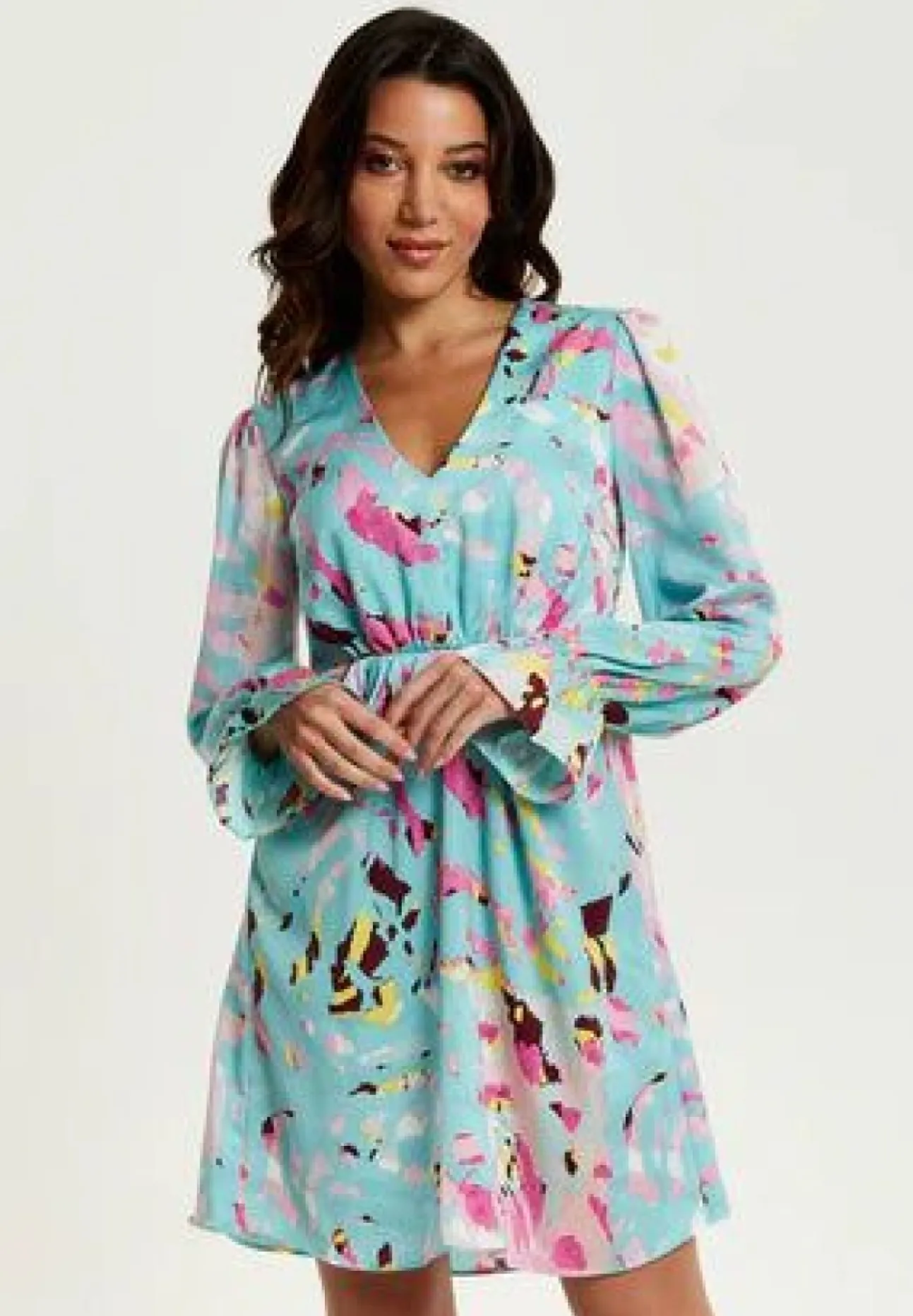 Women Liquorish Abstract Print Mini Dress With Open Back And Long Sleeves