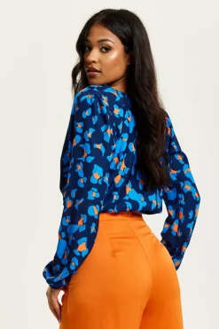 Women Liquorish Abstract Print Wrap Top In Pink Orange And Blue