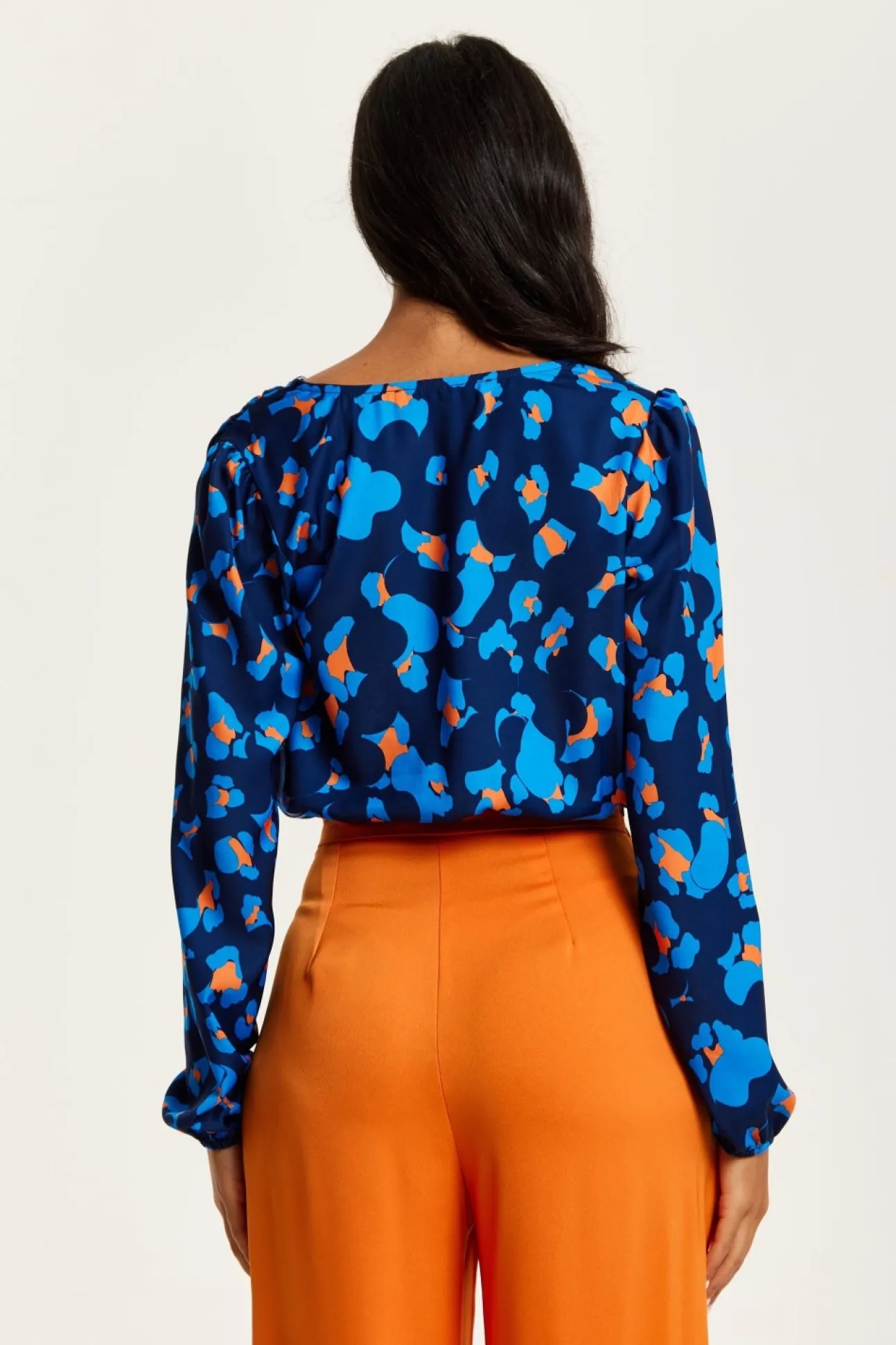 Women Liquorish Abstract Print Wrap Top In Pink Orange And Blue