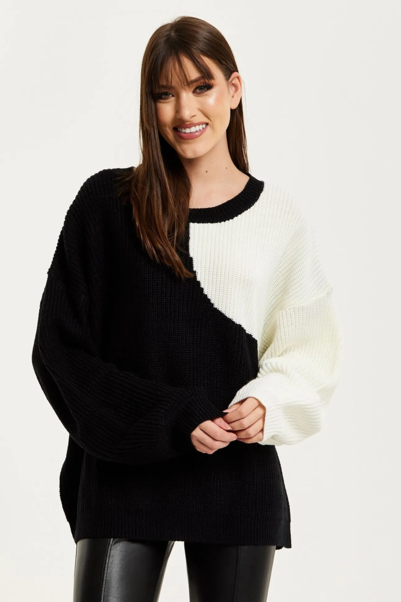 Women Liquorish Colour Block Jumper In Black And White