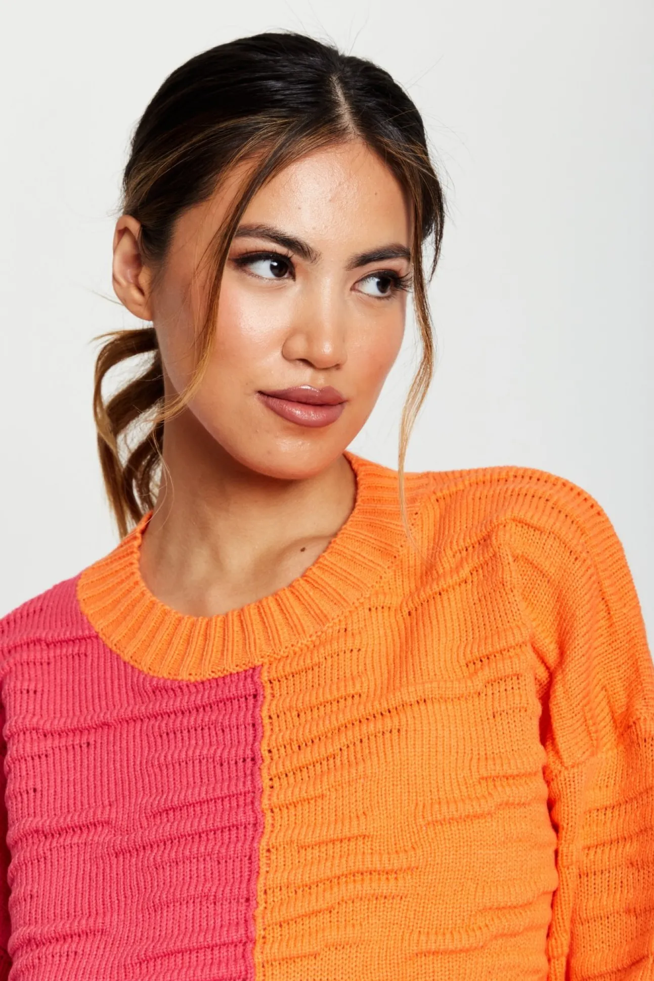 Women Liquorish Colour Block Jumper In Orange And Pink