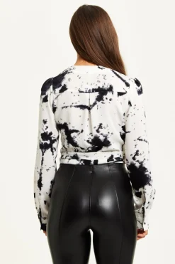 Women Liquorish Mono Abstract Print Wrap Top With Long Sleeves