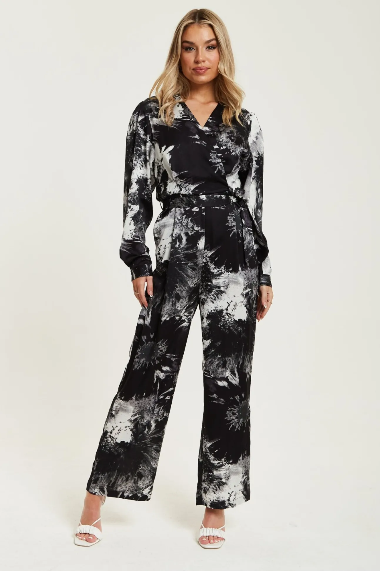 Women Liquorish Mono Abstract Print Jumpsuit With Long Sleeves