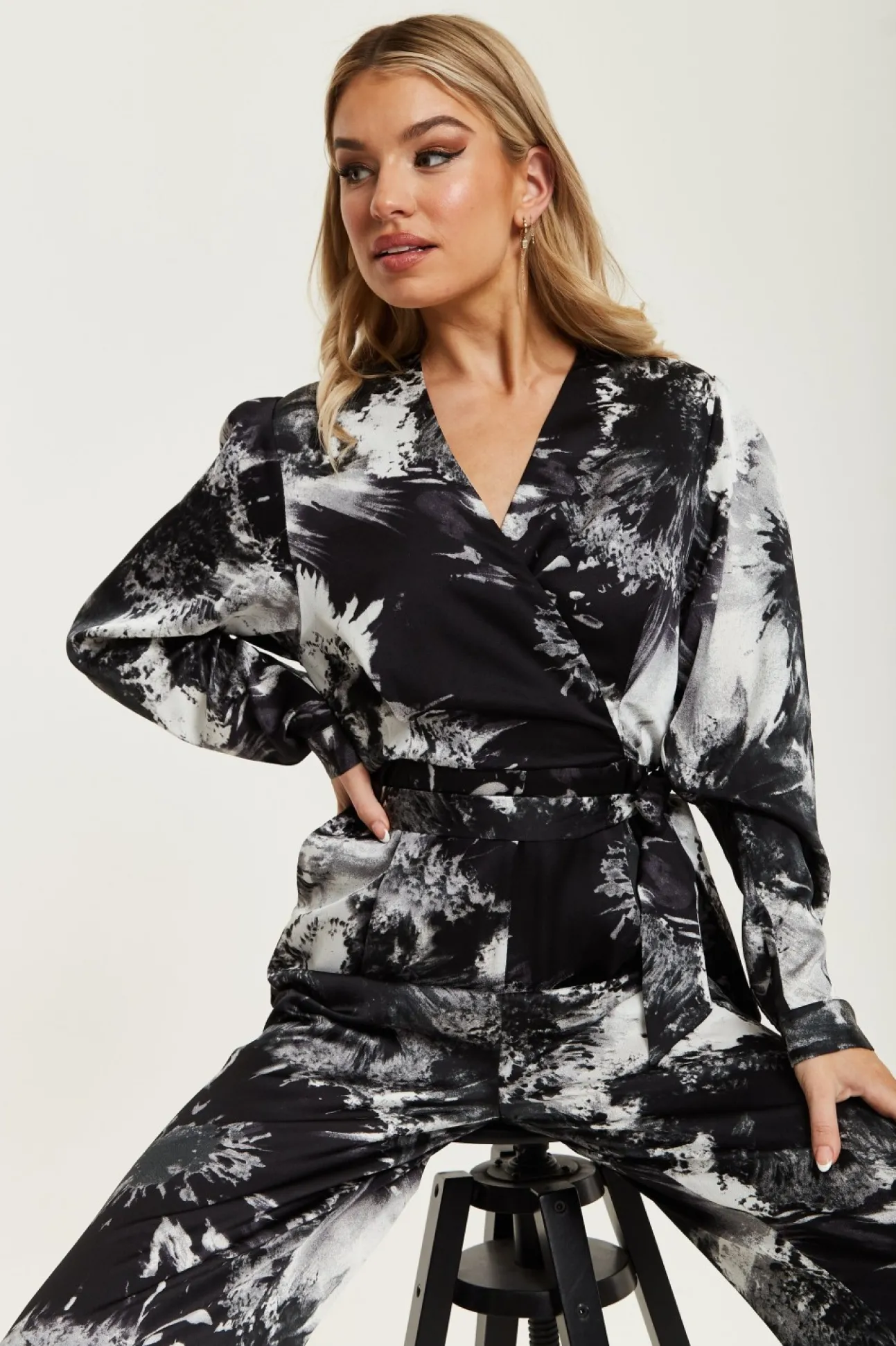 Women Liquorish Mono Abstract Print Jumpsuit With Long Sleeves