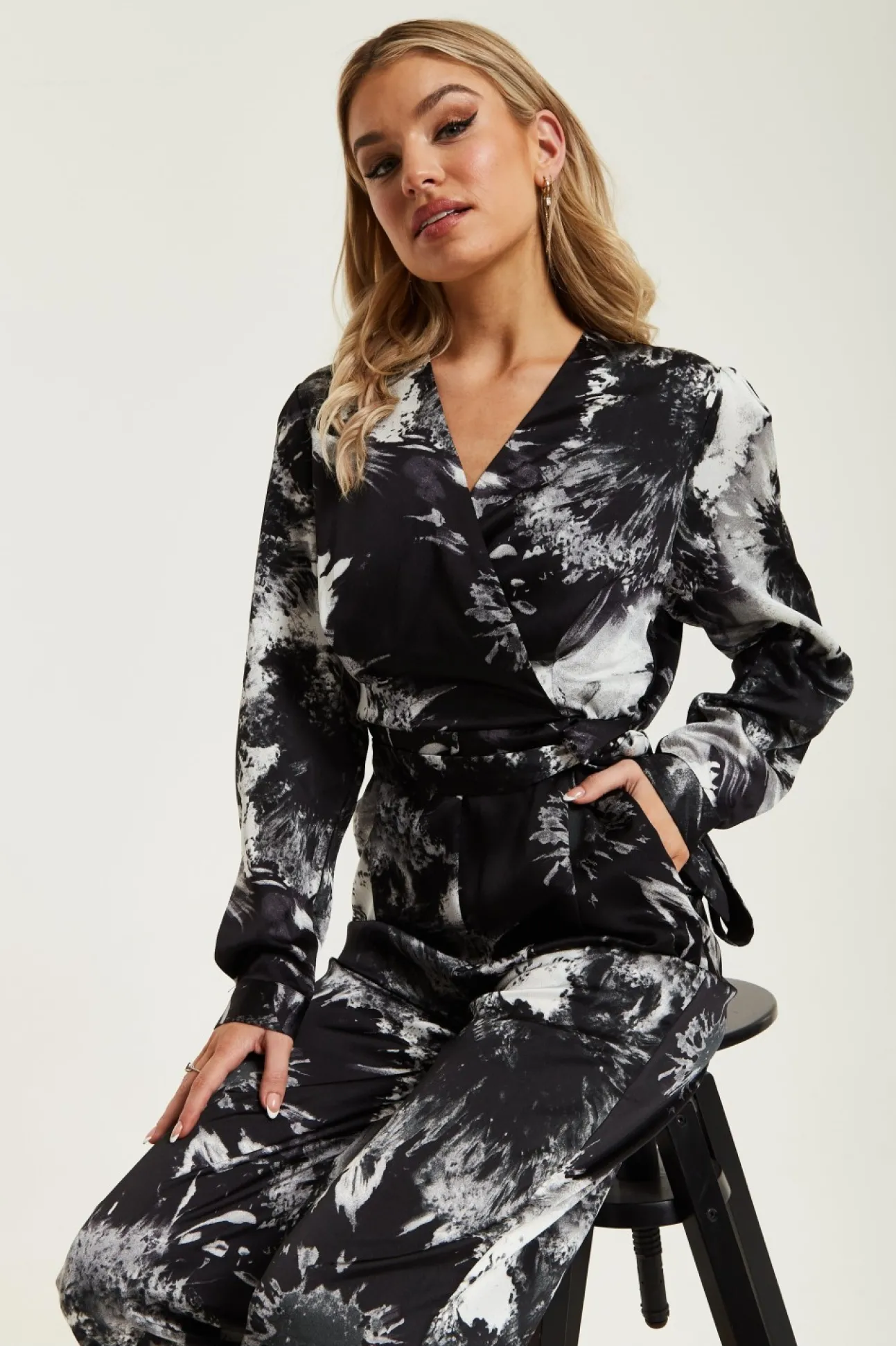Women Liquorish Mono Abstract Print Jumpsuit With Long Sleeves