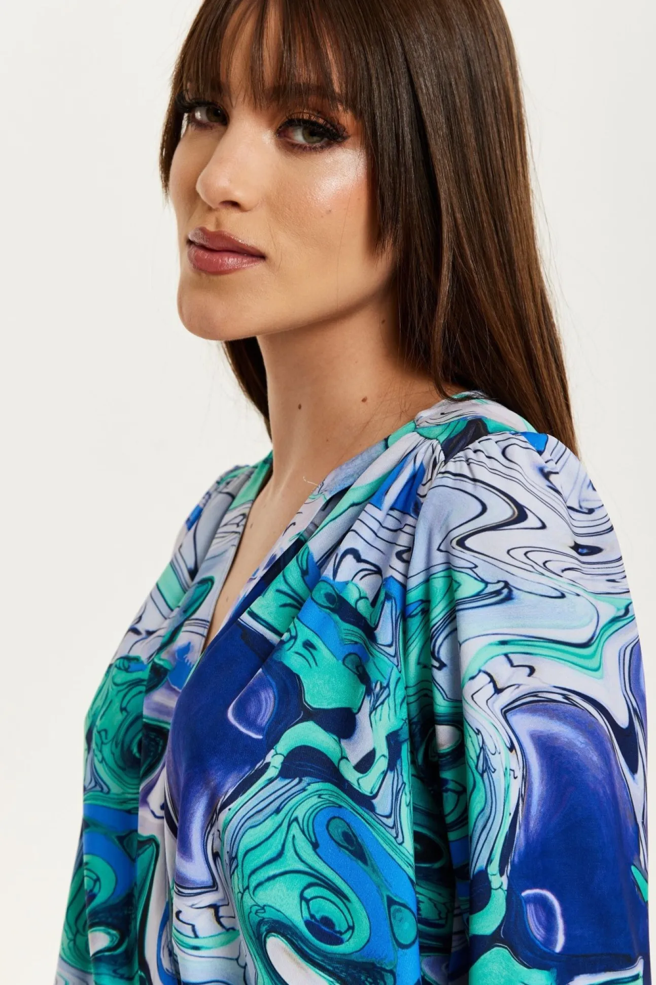 Women Liquorish Turquoise Marble Print Wrap Top